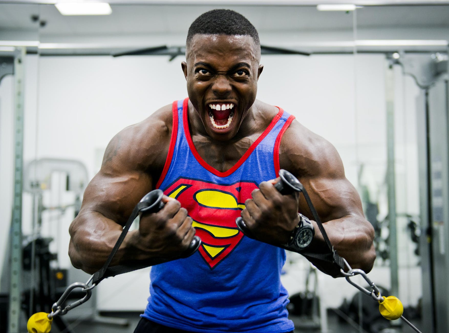 blue and red superman print tank top shirt